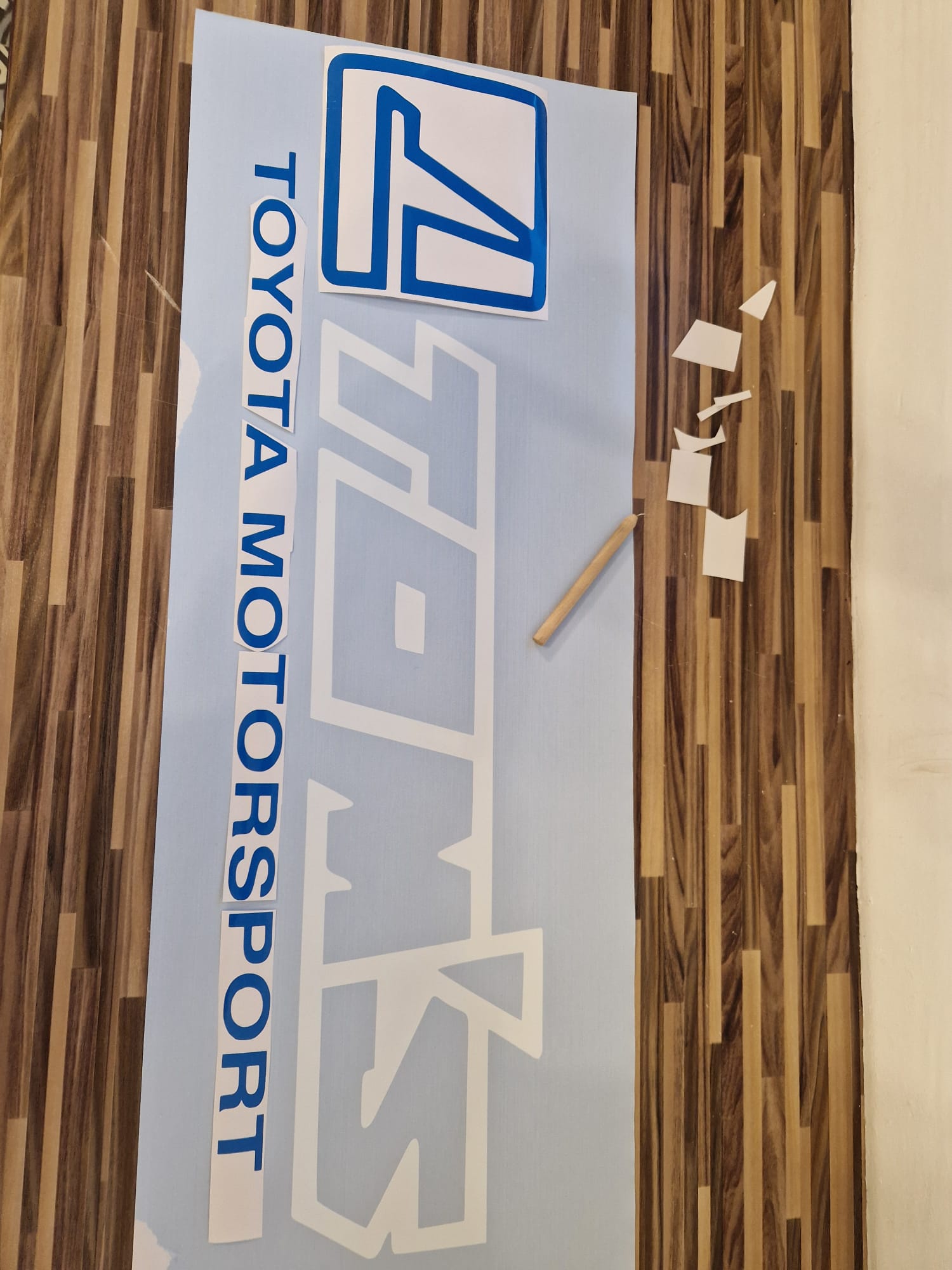 Toyota Motorsport decal being prepared on transfer paper