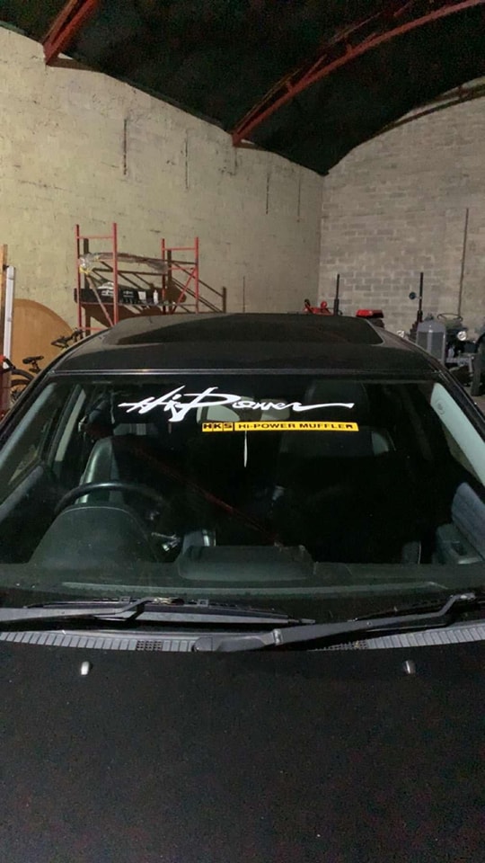 HK Power windscreen decal on a dark car